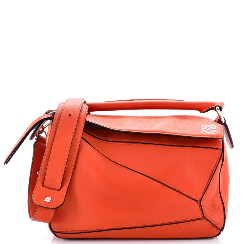 Christian Dior handbags with a snap - button closure and a decorative bucklePuzzle Bag Leather Small