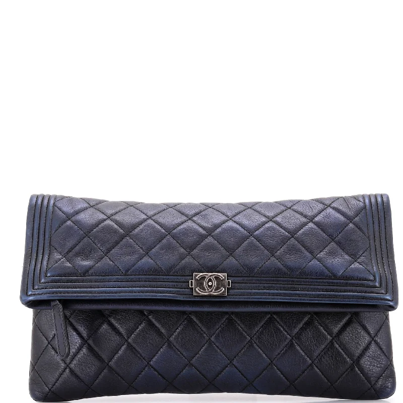 Christian Dior Saddle bags with a patent leather finish for a shiny lookBoy Beauty CC Clutch Quilted Lambskin