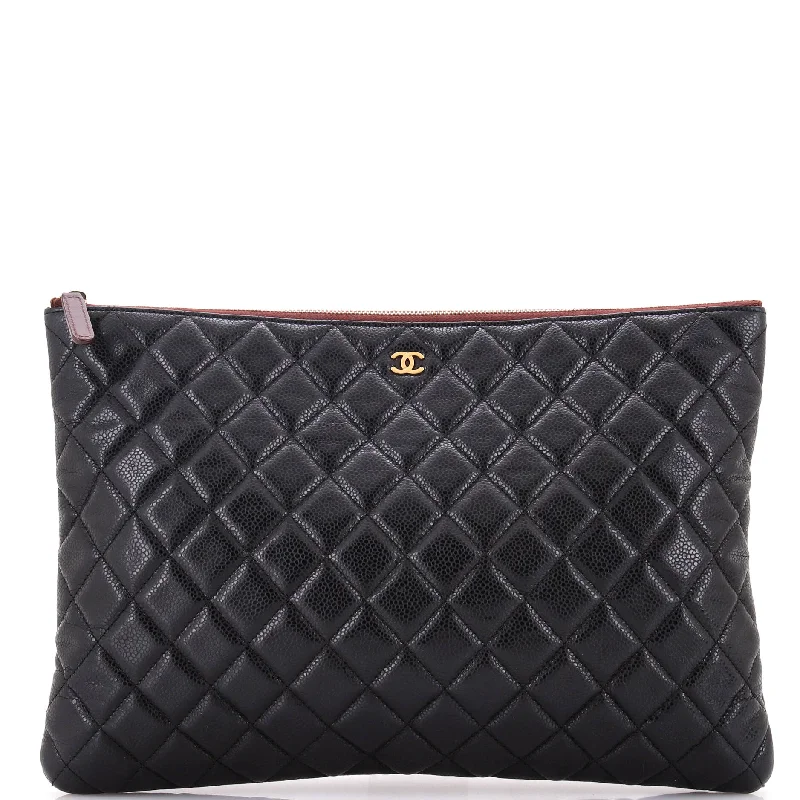 Christian Dior Saddle bags with a studded trim for a bold lookO Case Clutch Quilted Caviar Large