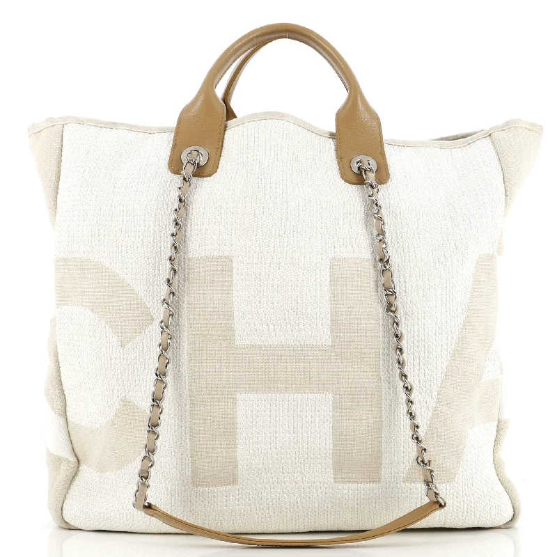 Christian Dior Saddle bags with a studded trim for a bold lookDeauville Logo Shopping Tote Printed Raffia Large