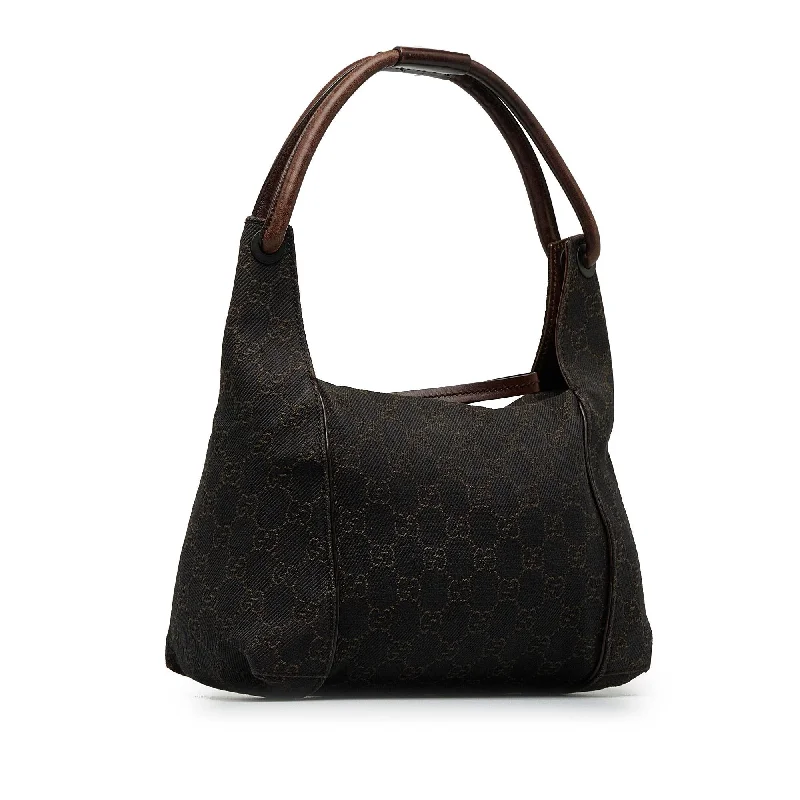 Women Gucci Sylvie bags with a monogram - embossed leatherGucci GG Canvas Shoulder Bag (XKt1NY)