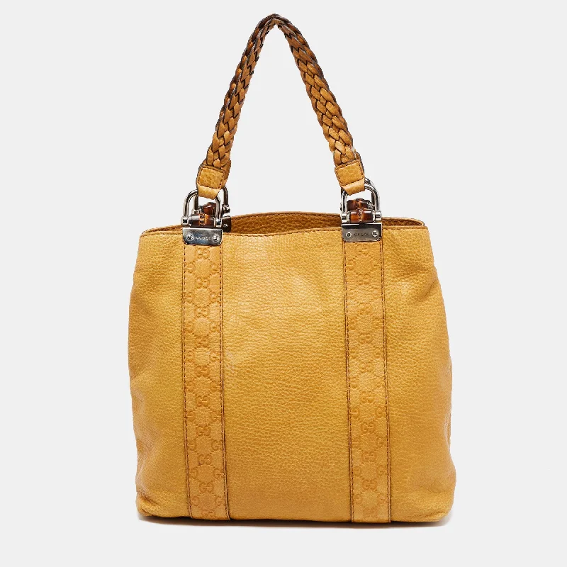 Ladies Gucci Dionysus bags in a pastel colorGucci Yellow Guccissima Leather Large Bamboo Bar Tote