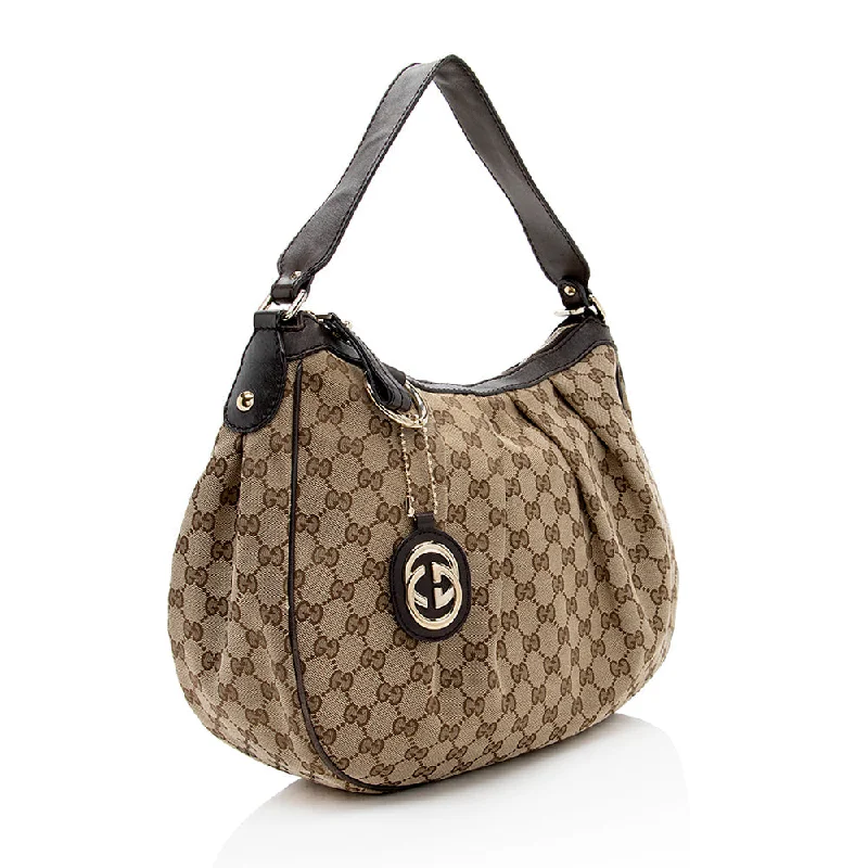 Gucci handbags for women with a patent - leather finishGucci GG Canvas Sukey Hobo (18123)