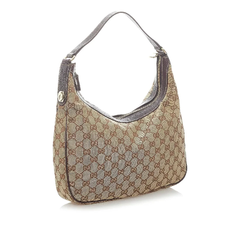 Women Gucci bags with a magnetic snap closure for easy accessGucci GG Canvas Shoulder Bag (33041)