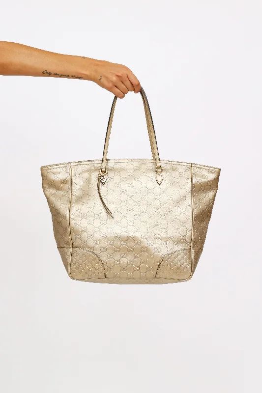 Women Gucci Sylvie bags with a leather - wrapped handleGold Guccissima Bree Tote Bag