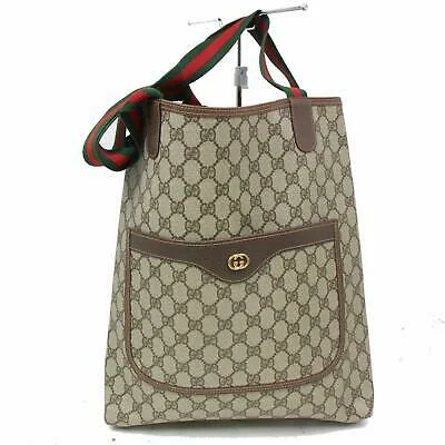 Ladies Gucci shoulder bags with a tassel decorationBrand Inspired Gucci Tote Bag Brown PVC