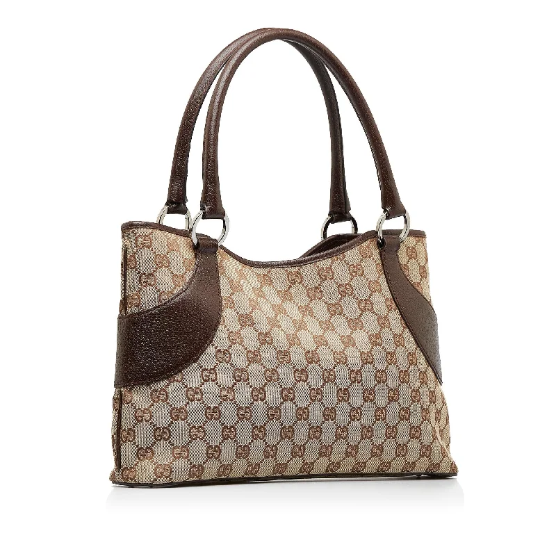 Gucci Marmont bags for women with gold - toned hardwareGucci GG Canvas Shoulder Bag (bz9OYw)