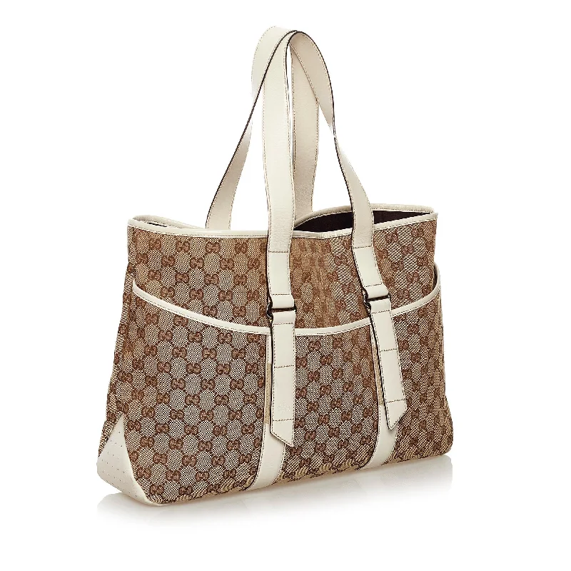 Women Gucci Sylvie bags featuring the signature web stripeGucci GG Canvas Tote Bag (32841)