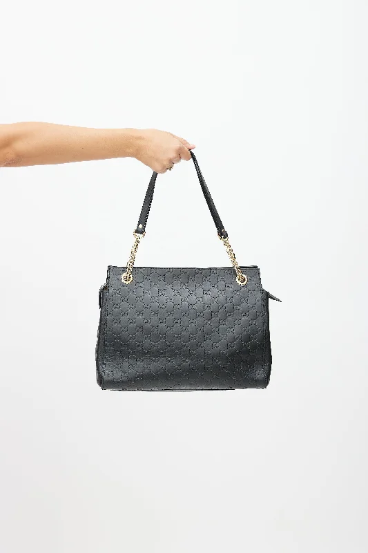 Women Gucci Sylvie bags with a crystal - embellished web stripeBlack Signature Leather Guccissima Shoulder Bag