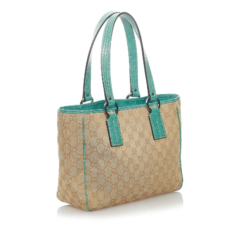 Women Gucci bags with a snap - button closure and a decorative charmGucci GG Canvas Tote Bag (32539)