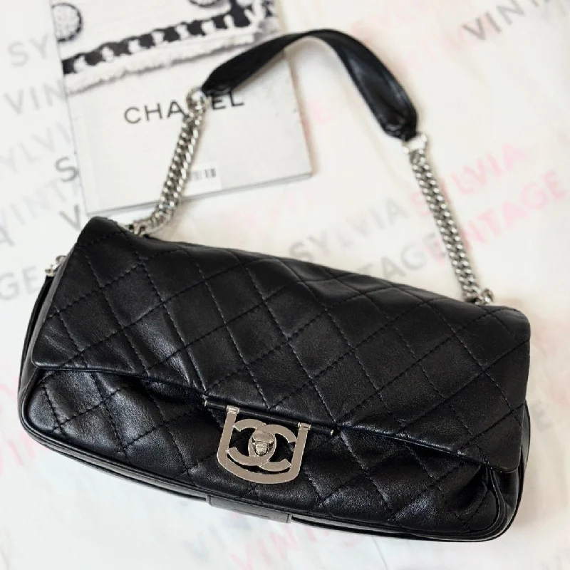 Chanel Quilted Leather Shoulder Bag for FashionistasChanel Sheepskin Silver Lock Flap Shoulder Bag Black 30cm