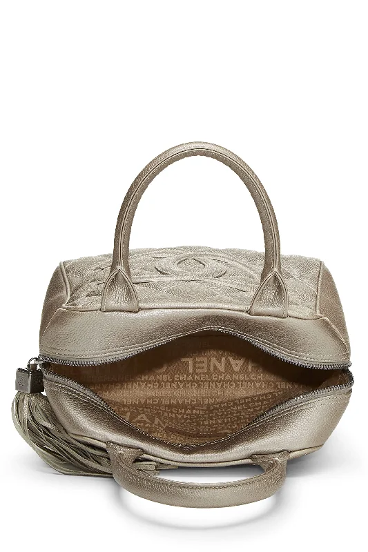 Chanel New Arrival Handbag with Gold HardwareChanel,  Metallic Silver Quilted Caviar Tassel Handbag, Silver